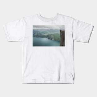 At the edge of a cliff Kids T-Shirt
